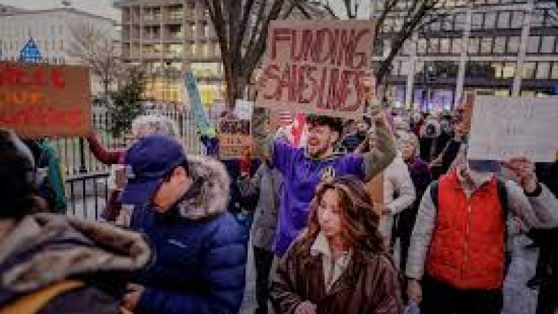 US Protesters March Against Trump's Federal Aid Freeze, Immigration Policies